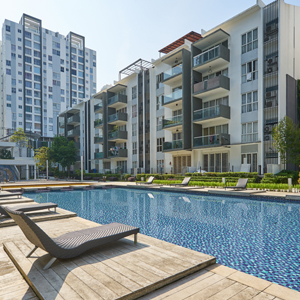 a view from the pool of a high-rise residential building complex